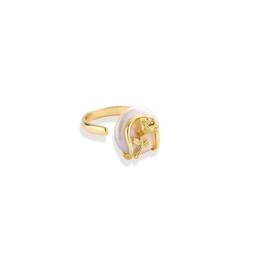 Gold-plated sculptural ring featuring a baroque pearl wrapped in a delicate rose and vine cage design