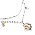 Delicate eco-brass jewelry set featuring gold star and silver moon crescents with clear zirconia crystal drops on cream background