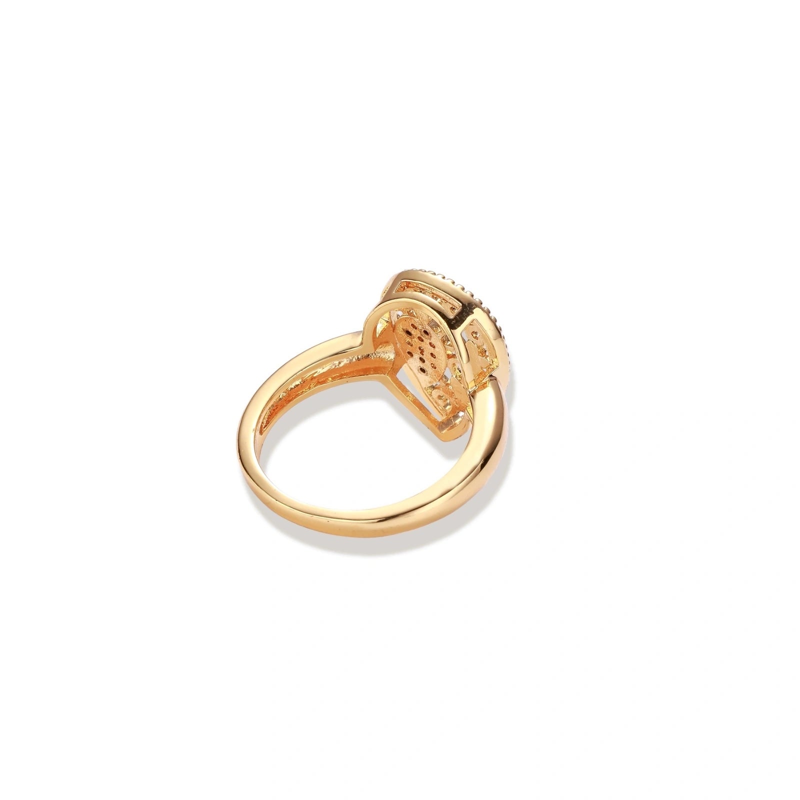 Teardrop-shaped gold-plated ring with turquoise enamel flowers and crystal pavé detail on cream background