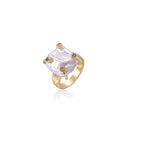 Gold ring with large iridescent baroque pearl and four colored gemstones on textured band