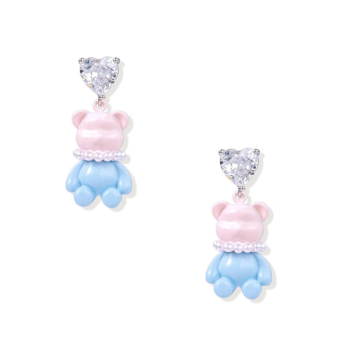 Cute pink teddy bear dangle earrings with clear crystal hearts and blue enamel details on white background.