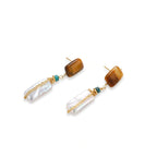 Gold-plated drop earrings with amber stones, teal beads, and wire-wrapped baroque pearls on cream background.